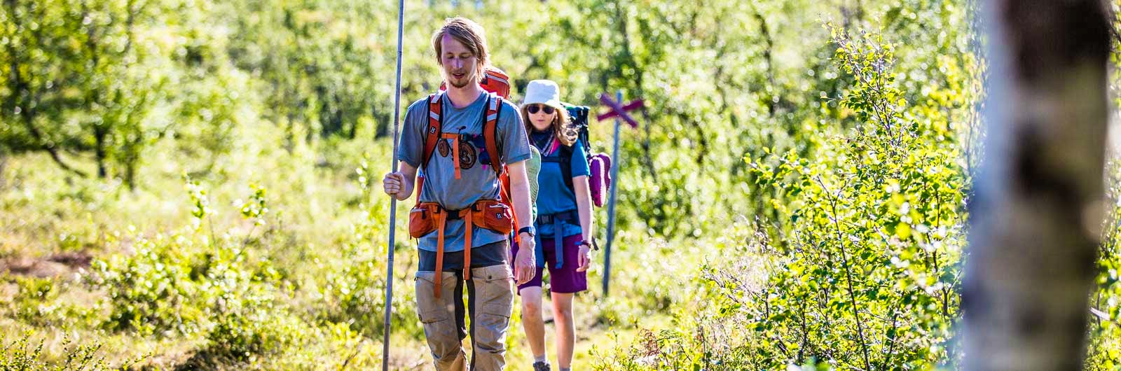 Two hikers on trail in Abisko