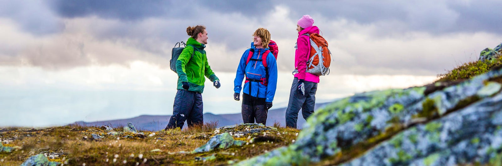 Mountain hikers with colourful jackets