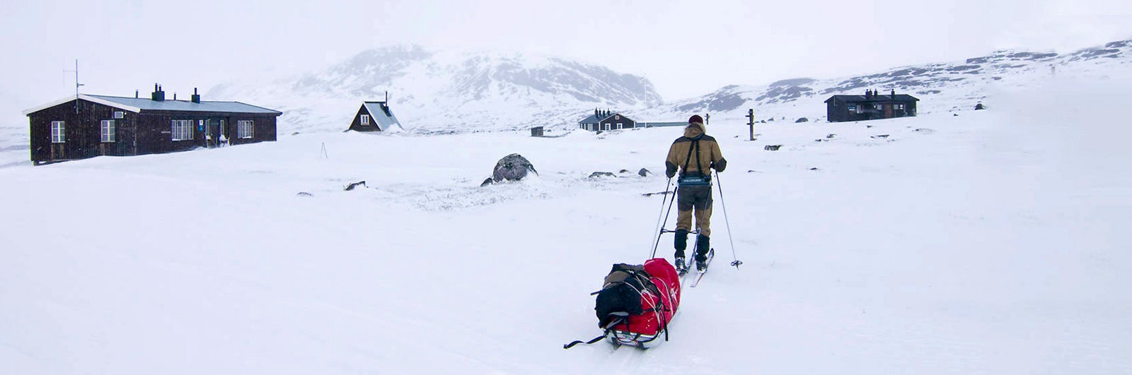 Winter near mountain cabin in Lappland
