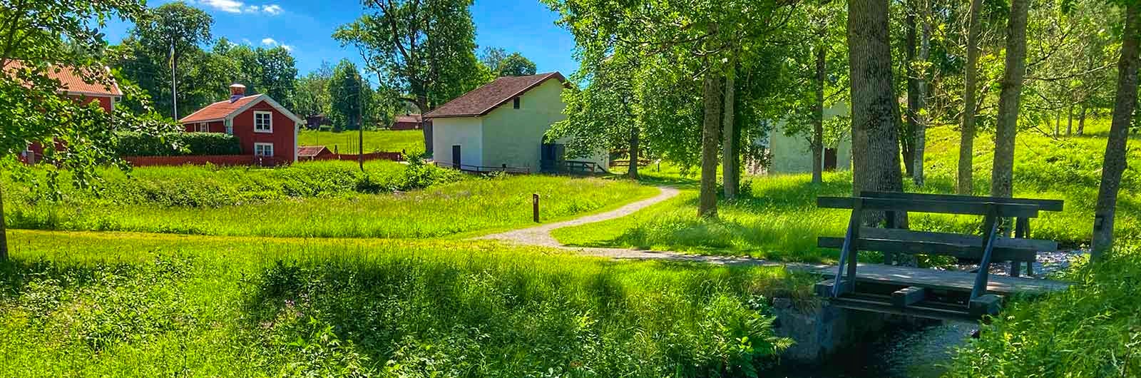 A house on a green meadow.