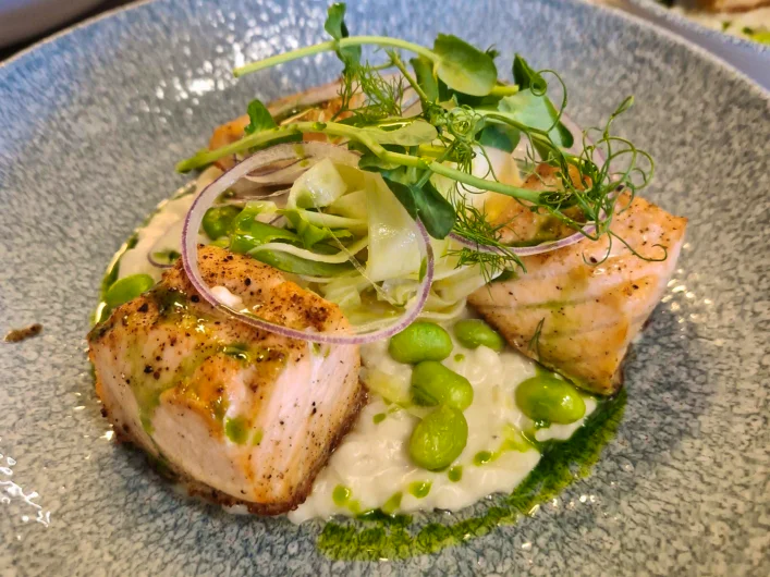 Fish dish served on a plate at Villa Gransholm.