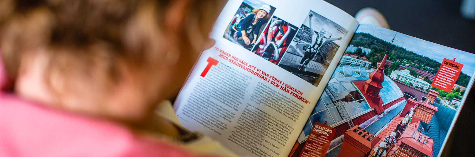 Woman is reading the magazine Tourist.