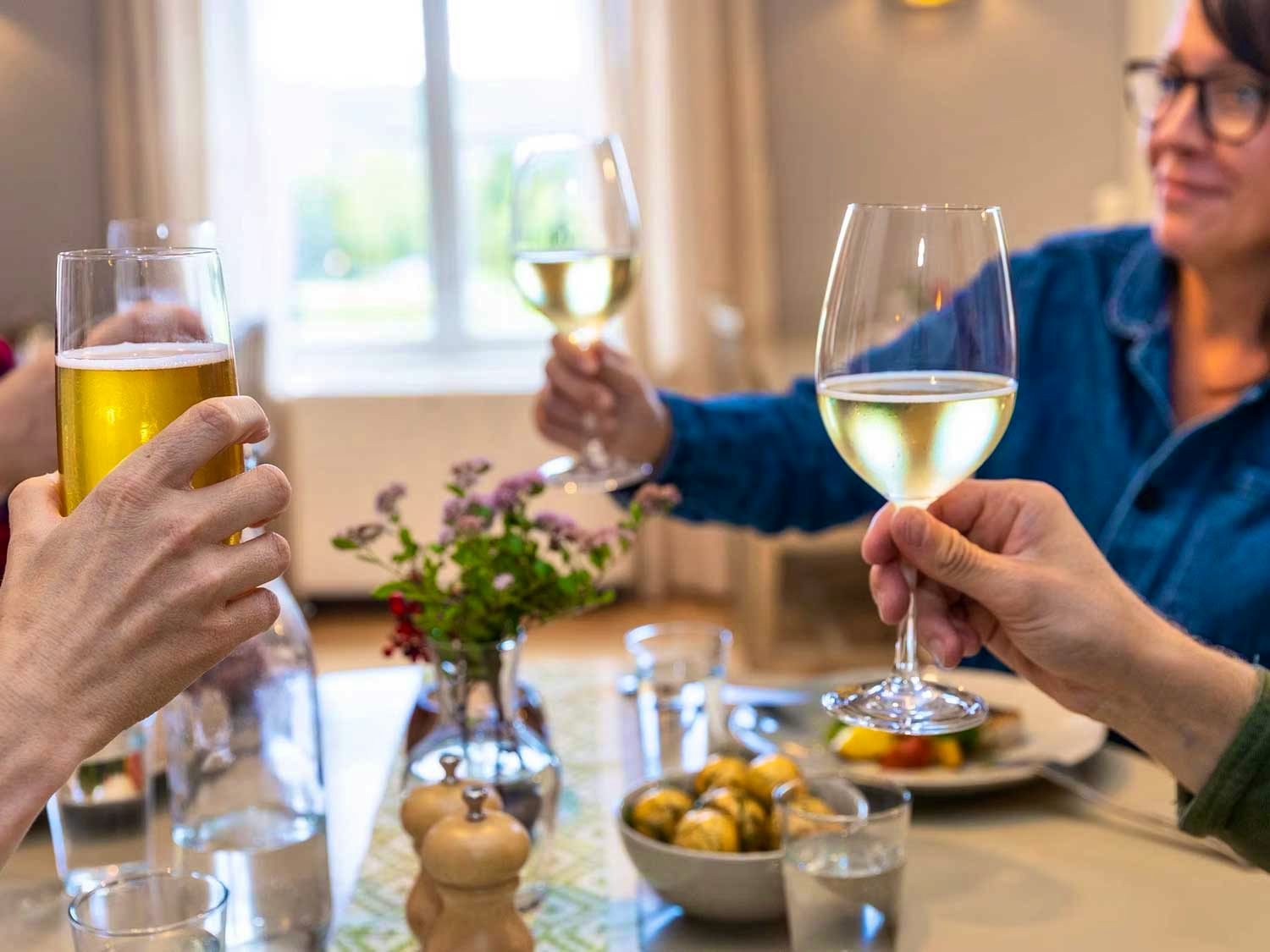 Toasting with wine and beer.