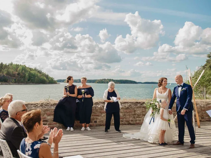 A couple getting married outside Fredriksborg Hotel.