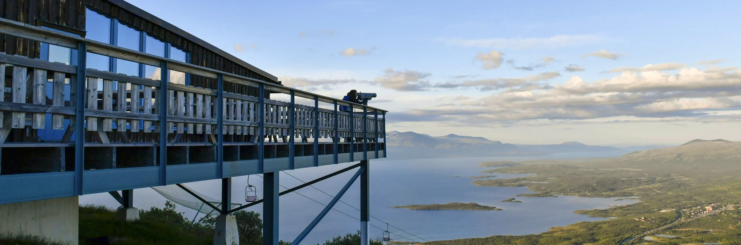 A view of a lake and mountains from STF Aurora Sky Station.